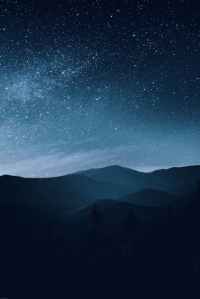 starry sky over mountains