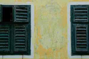 black wooden louver door window