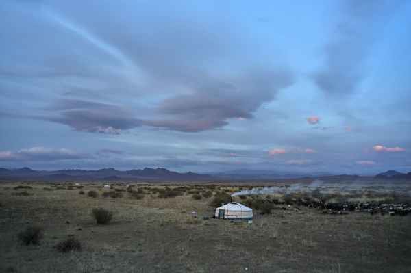 yurt in spacious valley in summer evening